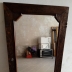 Specchio con cornice in legno scuro,