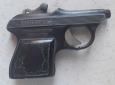 Pistola giocattolo in metallo con scritta 