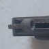 Pistola giocattolo in metallo con scritta