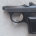 Pistola giocattolo in metallo con scritta