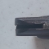 Pistola giocattolo in metallo con scritta