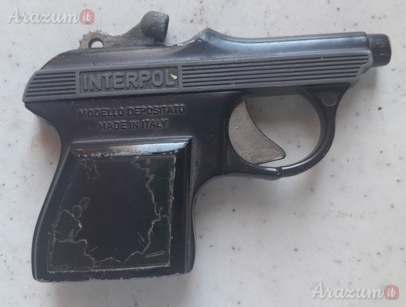 Pistola giocattolo in metallo con scritta 